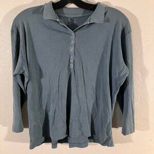 Jewel T's blue button-up polo‎ shirt